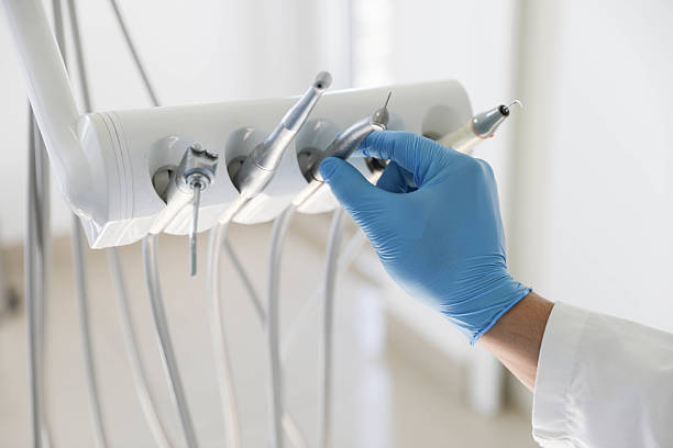 Professional Emergency Dentist technician working in Pocasset, MA